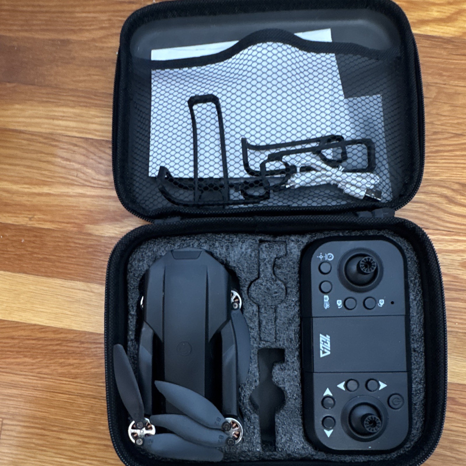 TEZA Foldable RC Quadcopter Drone w/ Remote Controller & Case, Black Electric