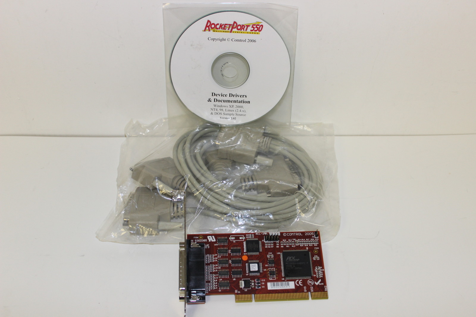 COMTROL 99205-9 ROCKETPORT 550 UPCI QUADCABLE RS232 WITH DB25M CABLE PCI  NEW