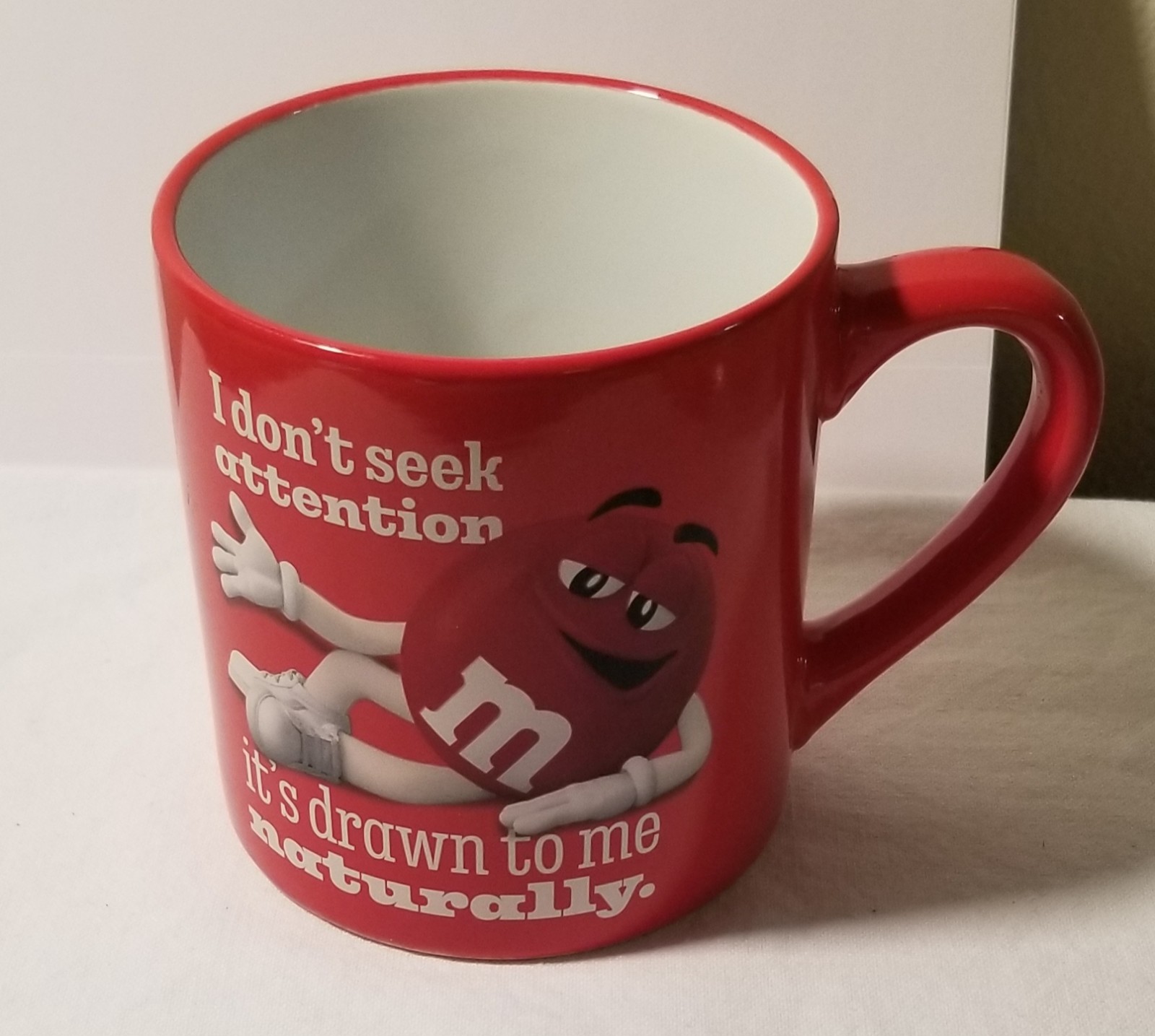 Red M&M's "I dont seek Attention" coffee mug