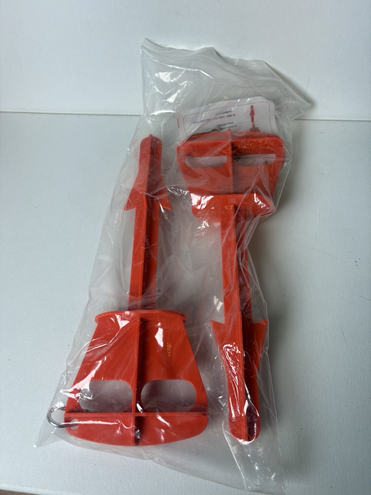 Red Plastic Stakes/ Field Dressing Tool