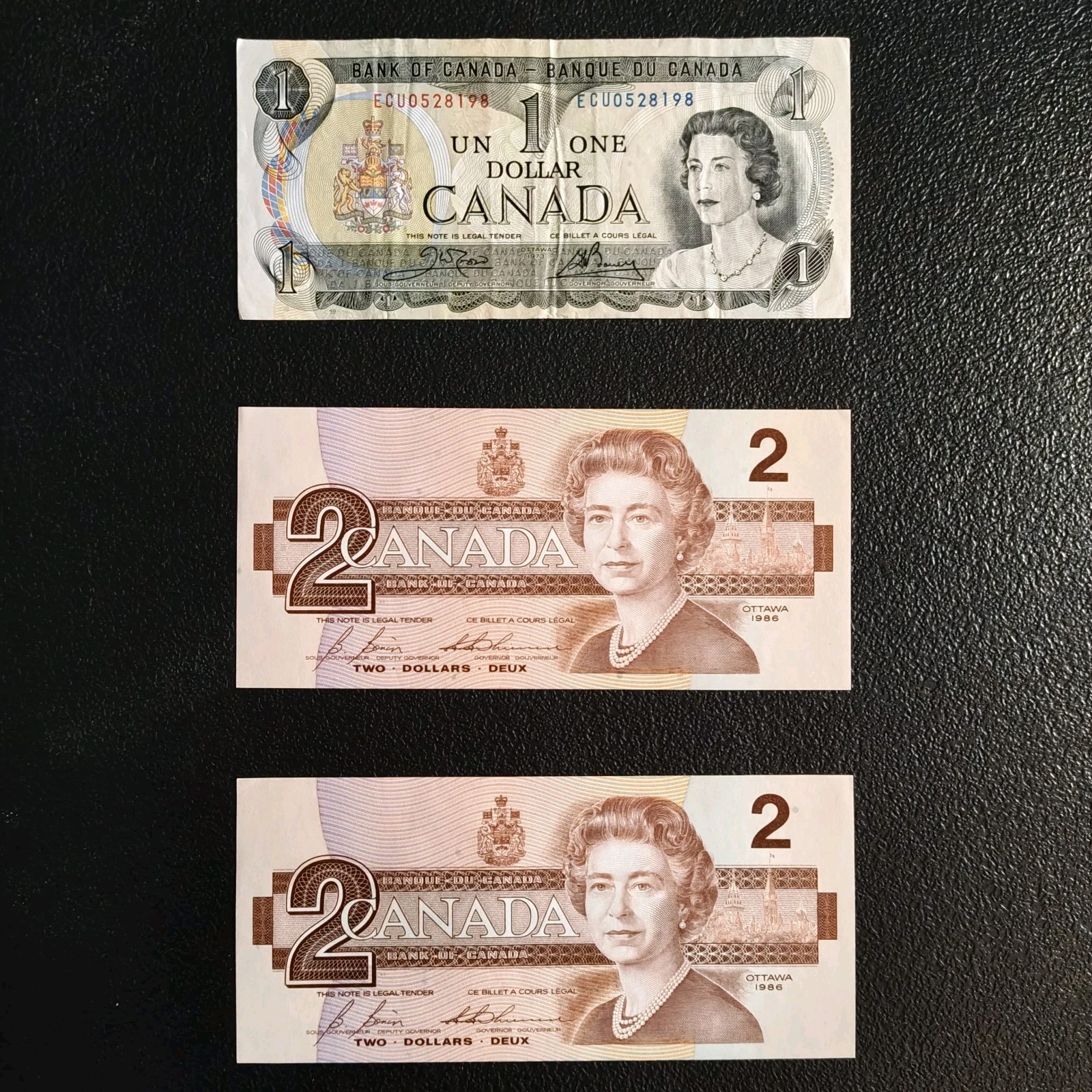 Vintage Canadian Banknotes – $1 (1973) & Two $2 Bills (1986) – Lot of 3