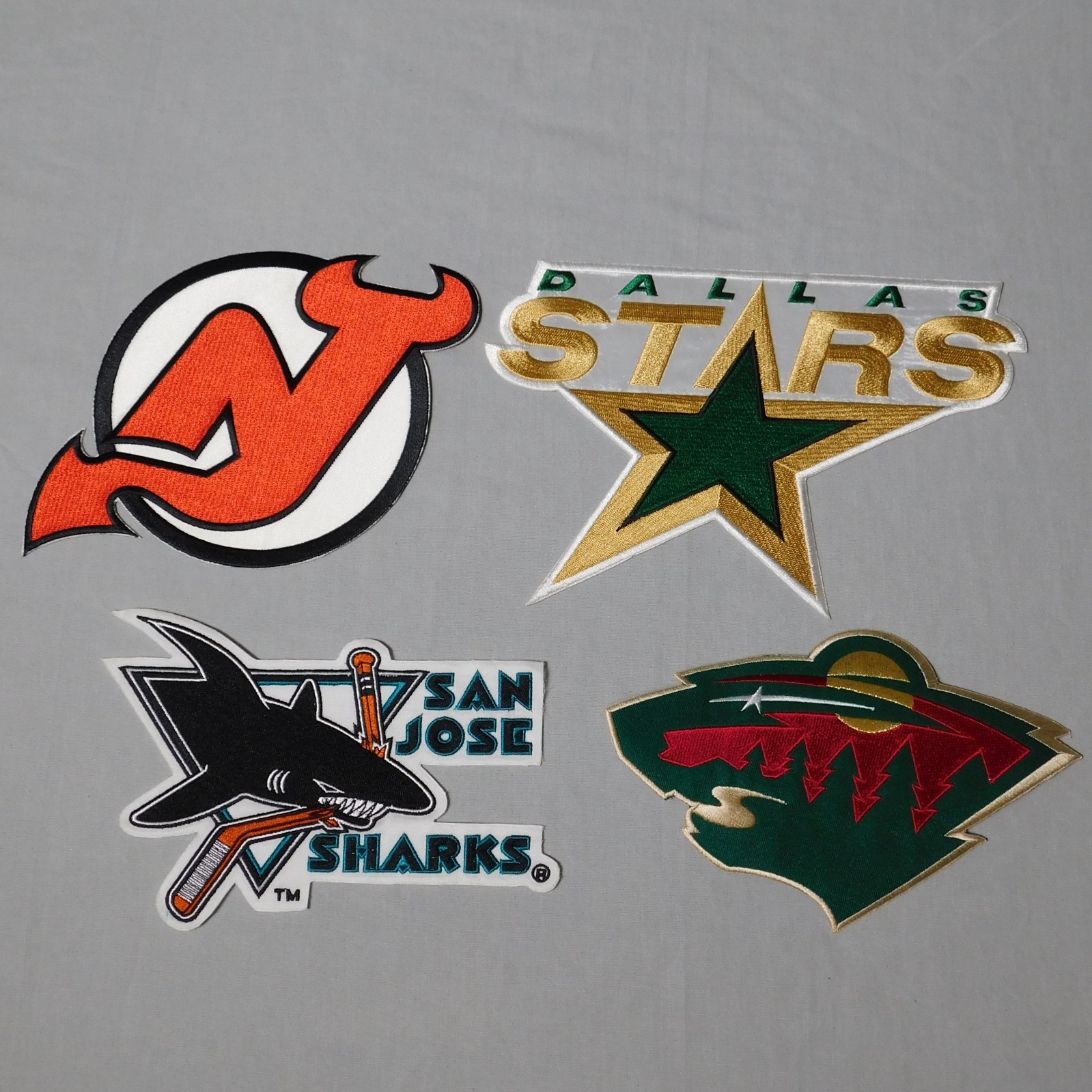 Vintage 8" NHL Hockey Team Logo Jersey Patches Lot of 4 Devils Stars Sharks Wild