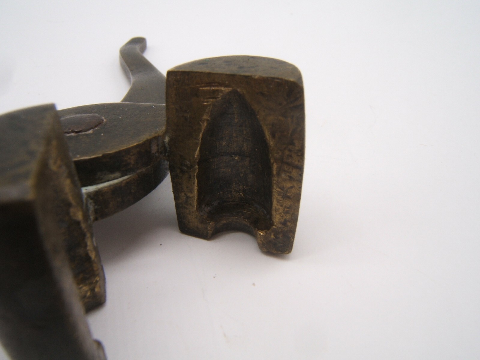 ANTIQUE IRON BULLET MOLD WELL MADE