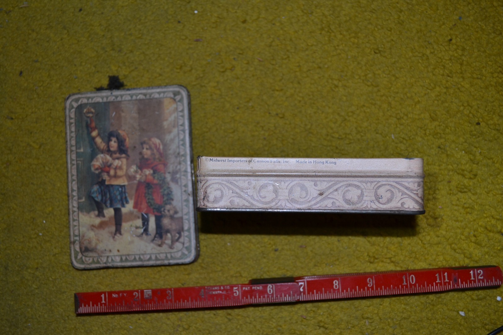 tin box Midwest imports of Cannon Falls Inc. two young girls with presents