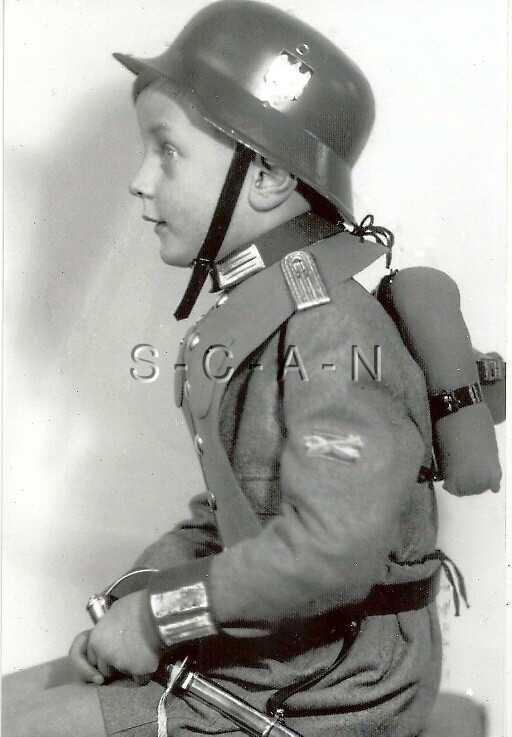 1940s (4 x 6) Repro German Real Photo- Youth Plays Soldier- Helmet- Sword- Ruck