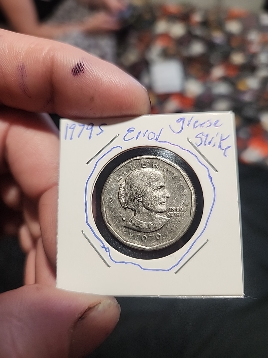 1979-S SUSAN B. ANTHONY DOLLAR  OBVERSE 'STRUCK THROUGH GREASE' ERROR