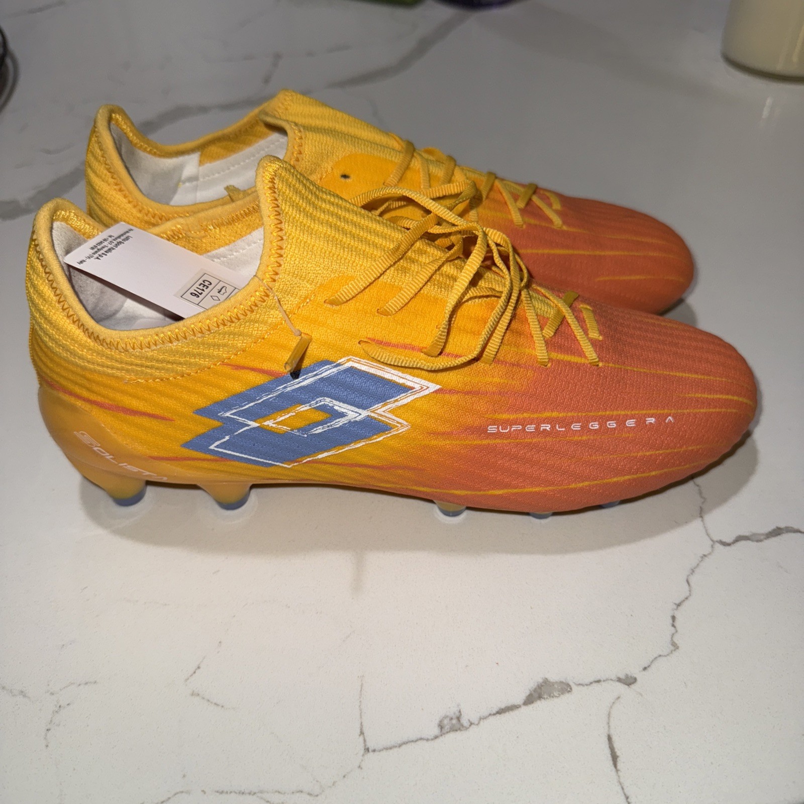Lotto Men’s Solista 200 IX FG Size 7.5 Orange/Yellow |221353-CX3|