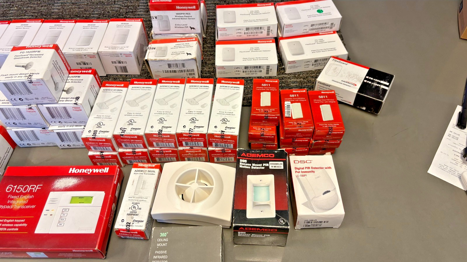 Lot Of 60 Honeywell  Motion Sensor, Glass break , Transmitters, and Moore