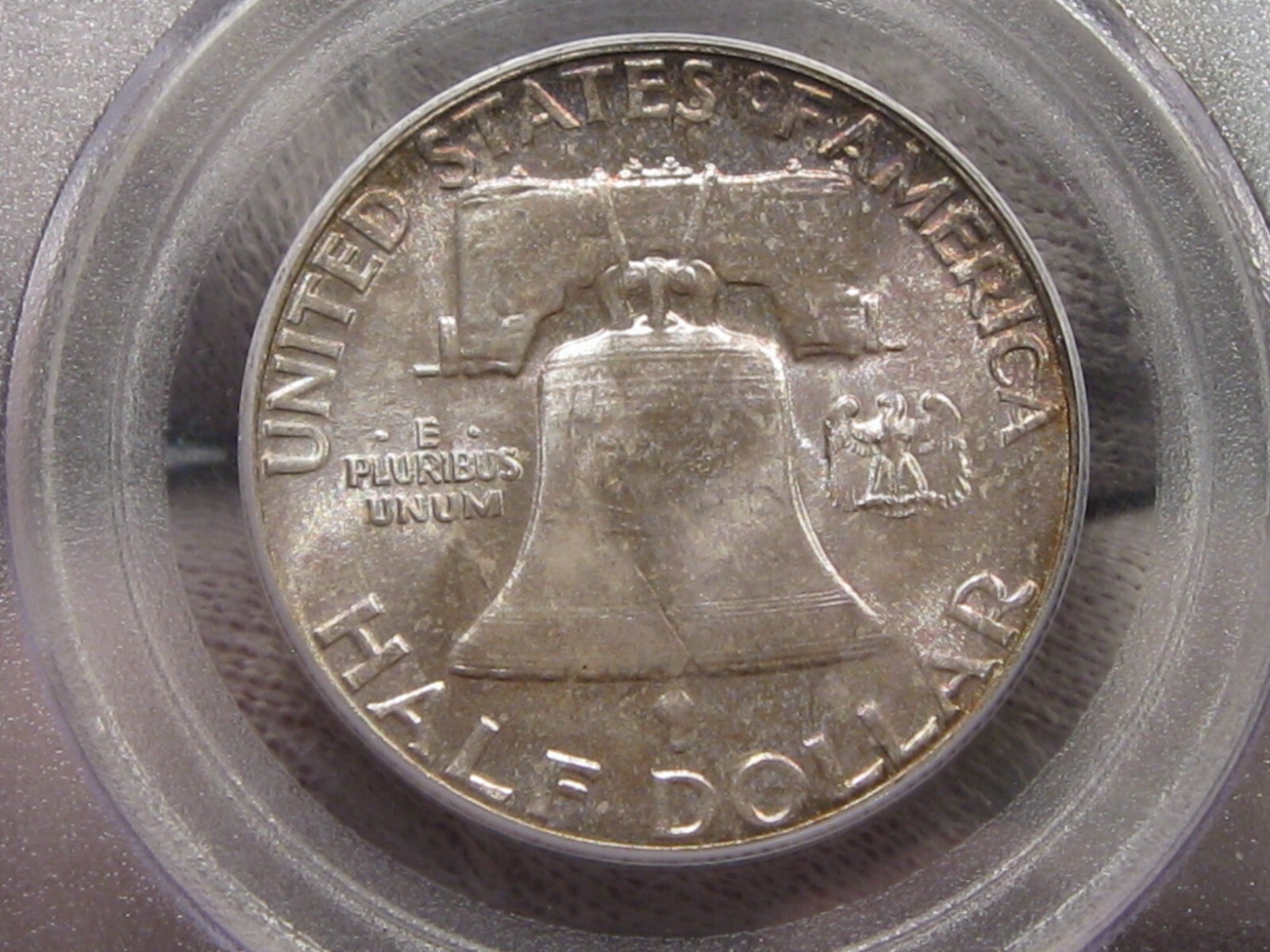 BU GEM TONED 1958 Franklin Half Dollar PCGS MS65. #44