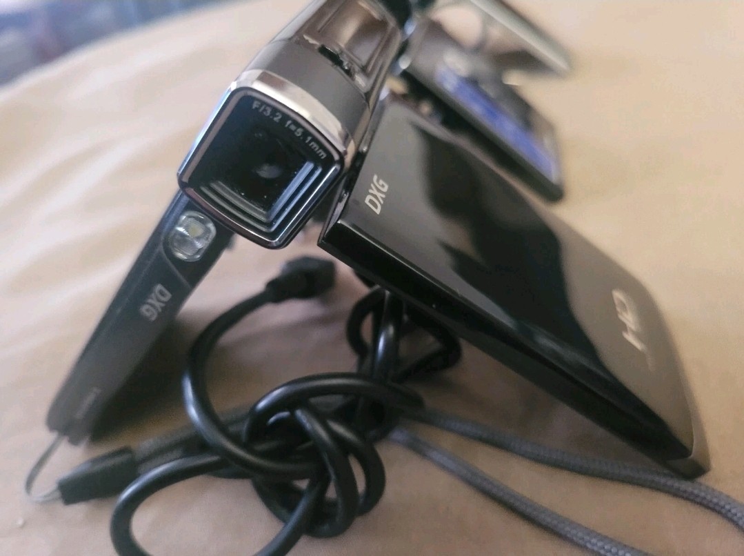 TEN Portable Handheld Camcorders In (Excellent Condition) w/ cords and case