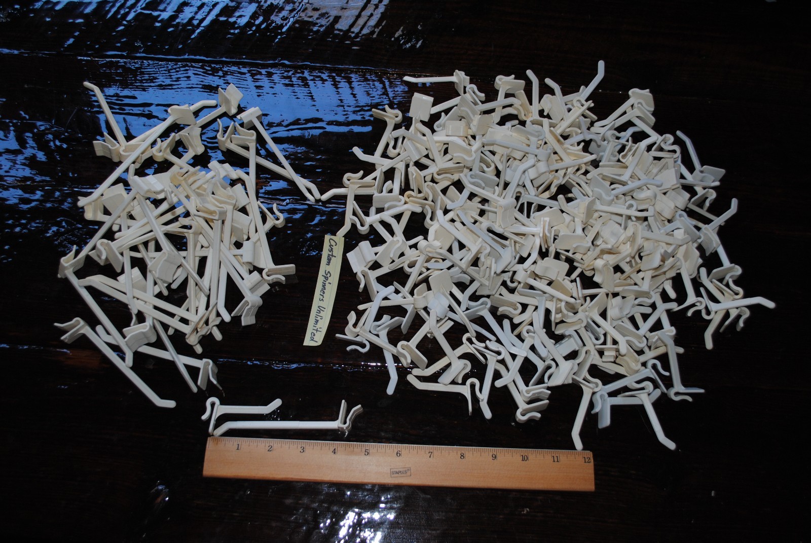 25 Plastic Snap Snap-On Peg Hook - 4" white cardboard counter wire rack display