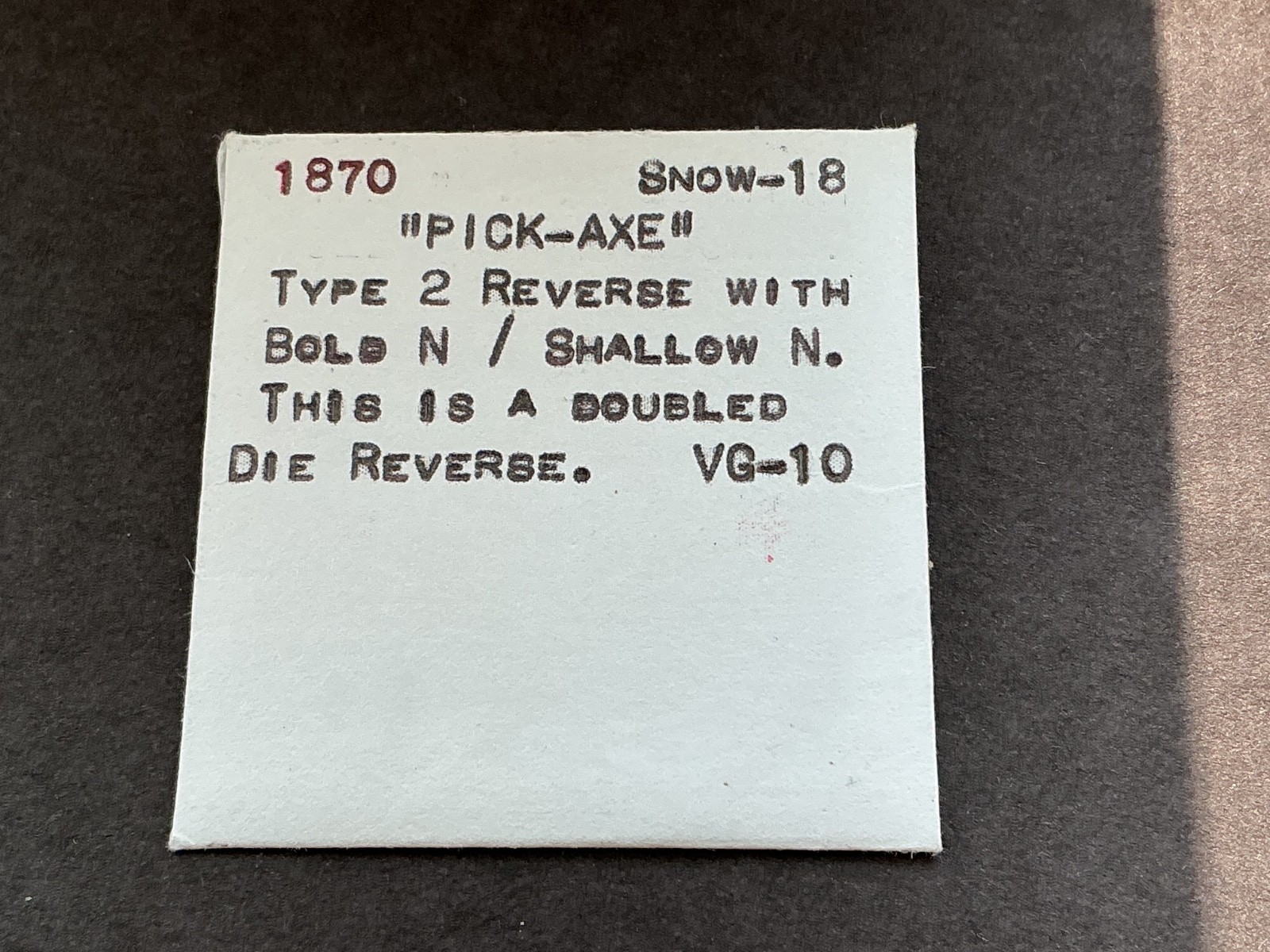 1870 indian head cent “ PICK AXE “. VG-10 choice