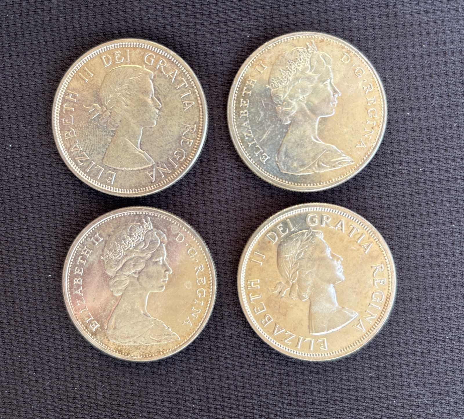 Lot of 4 Canadian Silver Dollars