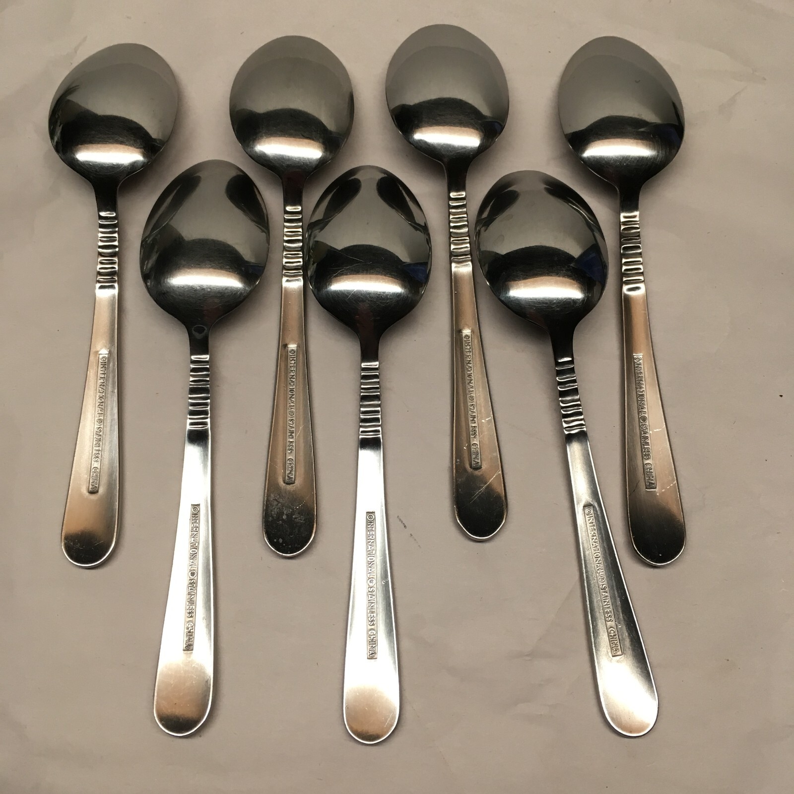 39pc International Stainless Flatware Ribbed Neck Vertical Lines China
