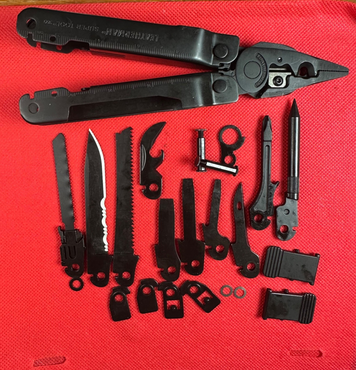 NEW parts from a Black Leatherman Super Tool 300 EOD: 1 Part for repairs or mods