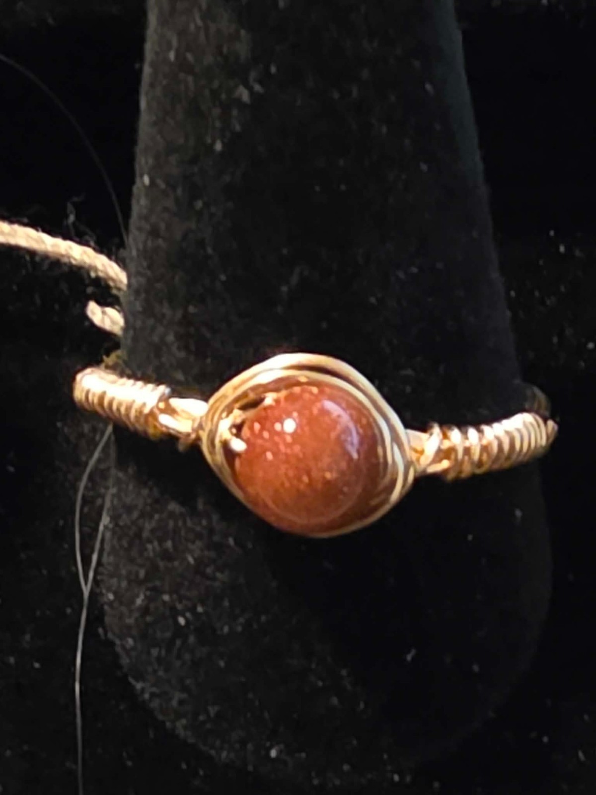 Handmade size 10 Wire-Wrapped Goldstone Ring with Gold-Tone Plated Wire