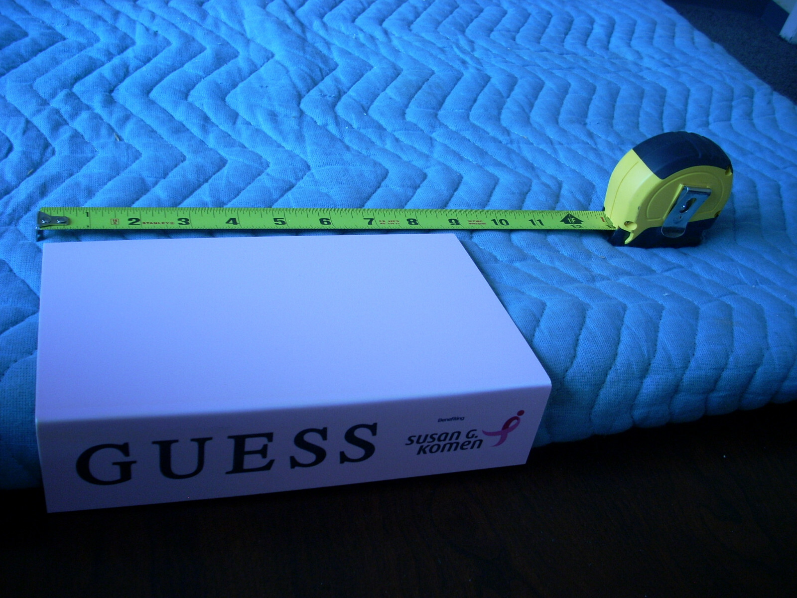 GUESS ADVERTISING SHELF/ TABLE END INSERT PROMOTING SUSAN G. KOMEN FOUNDATION