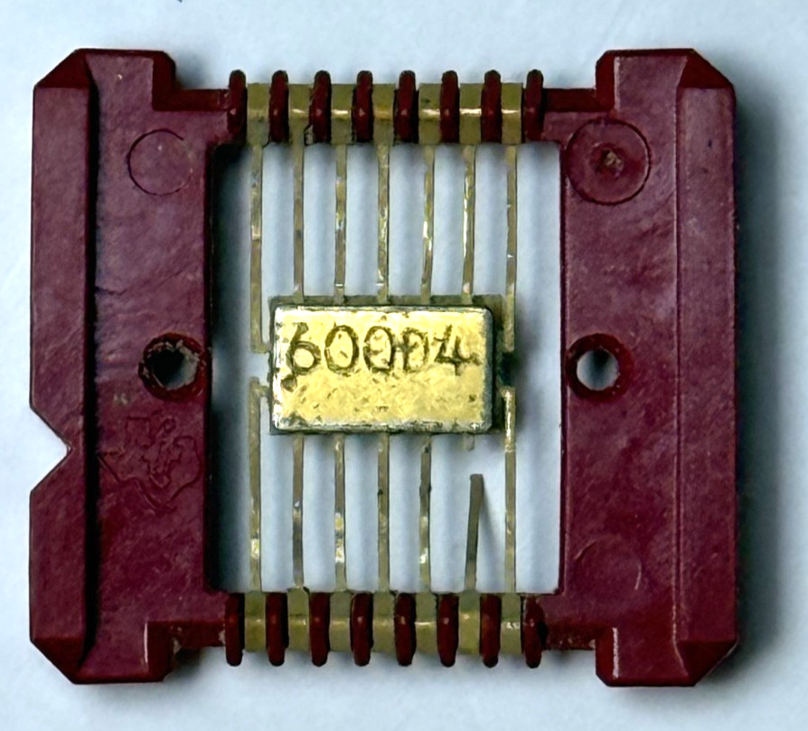 Two 1966 Texas Instruments Integrated Circuits (IC) in Red Carriers