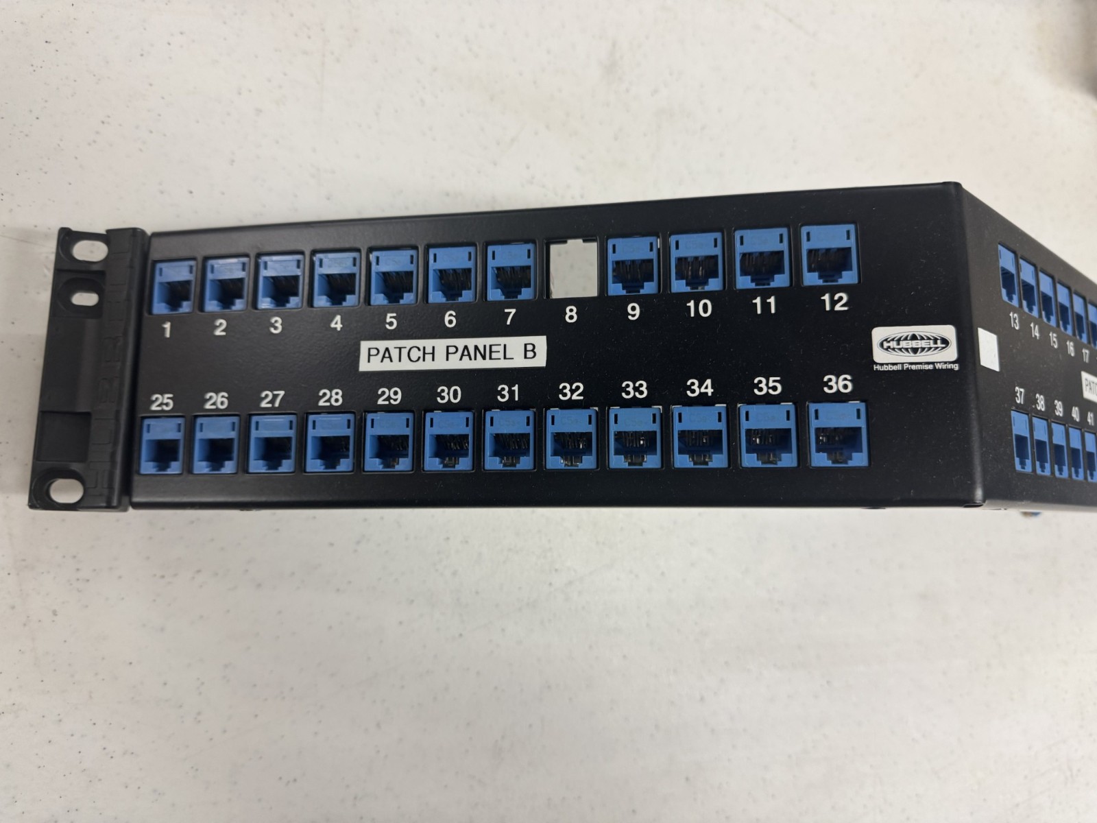 USED HUBBELL UDXA48 48 PORT ANGLED PATCH PANEL LOADED WITH CAT 5e JACKS!