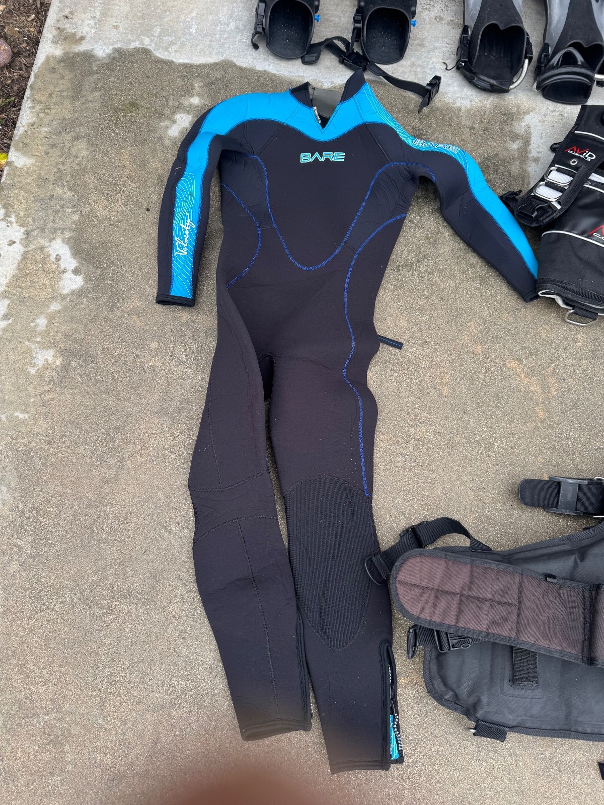 scuba diving equipment set. BCDs and wetsuit
