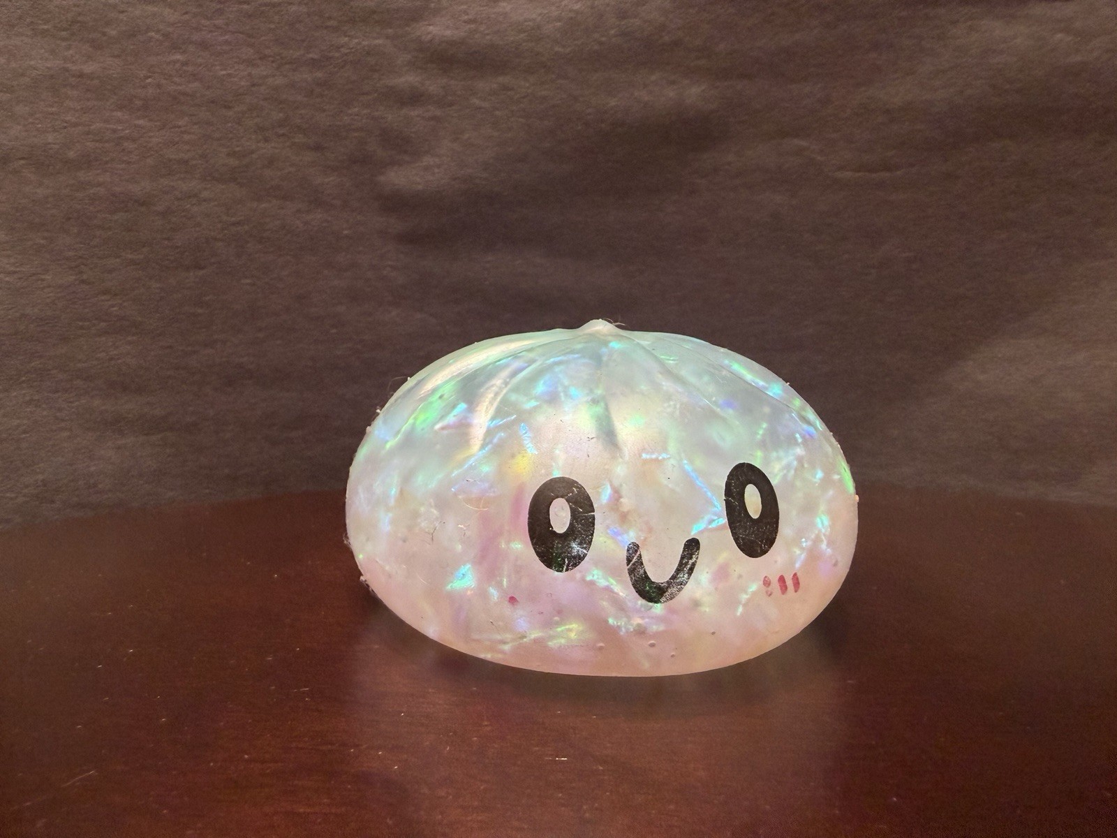 Iridescent Clear Gel Plastic Squeeze Ball Stress Reliever with Cute Face Design