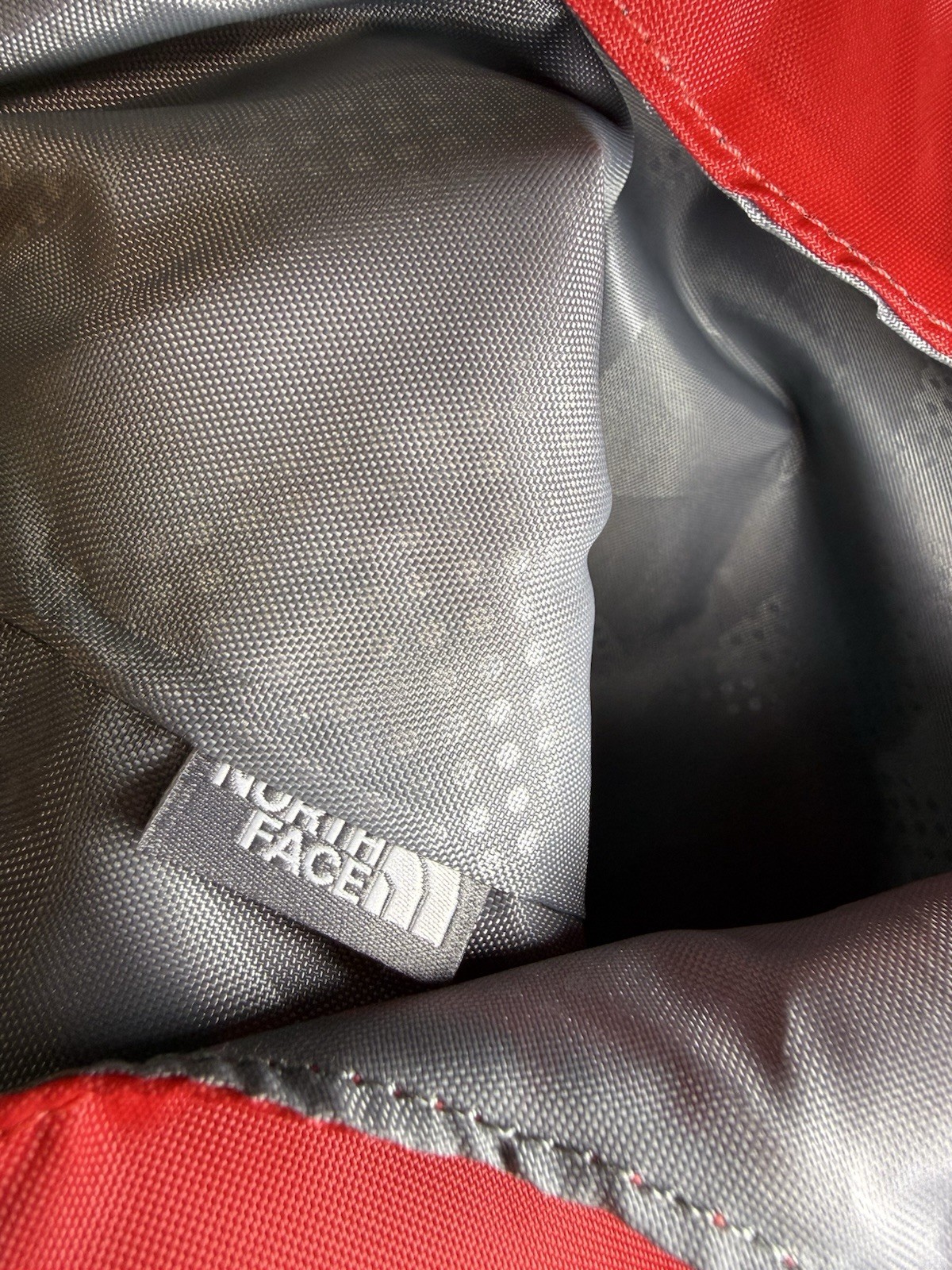 The North Face Mountain Athletics On The Run Bag Red Gray 23L Mesh Pocket