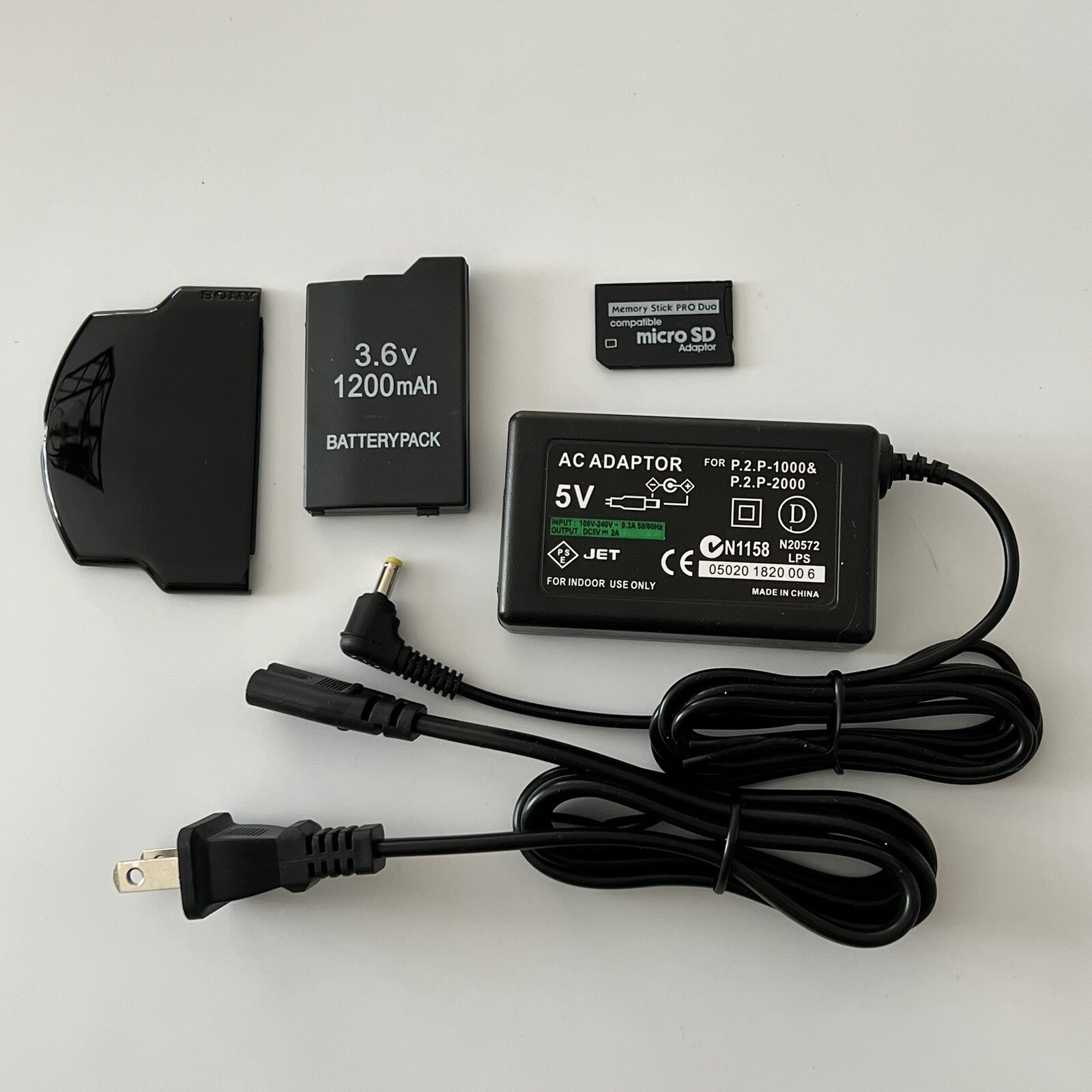 QUALITY Sony PSP 2000 PSP 3000 Kit - Battery, Charger, Cover, 32gb Memory Card