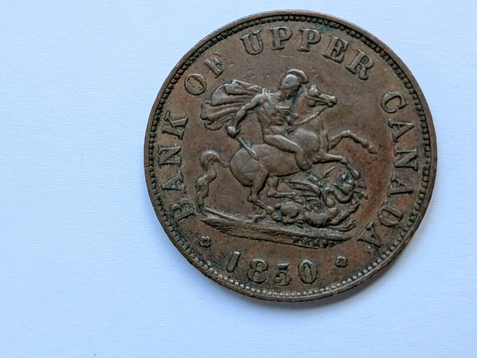 Canada Token Bank of Upper  Canada 1850 One Half Penny Token in used condition.