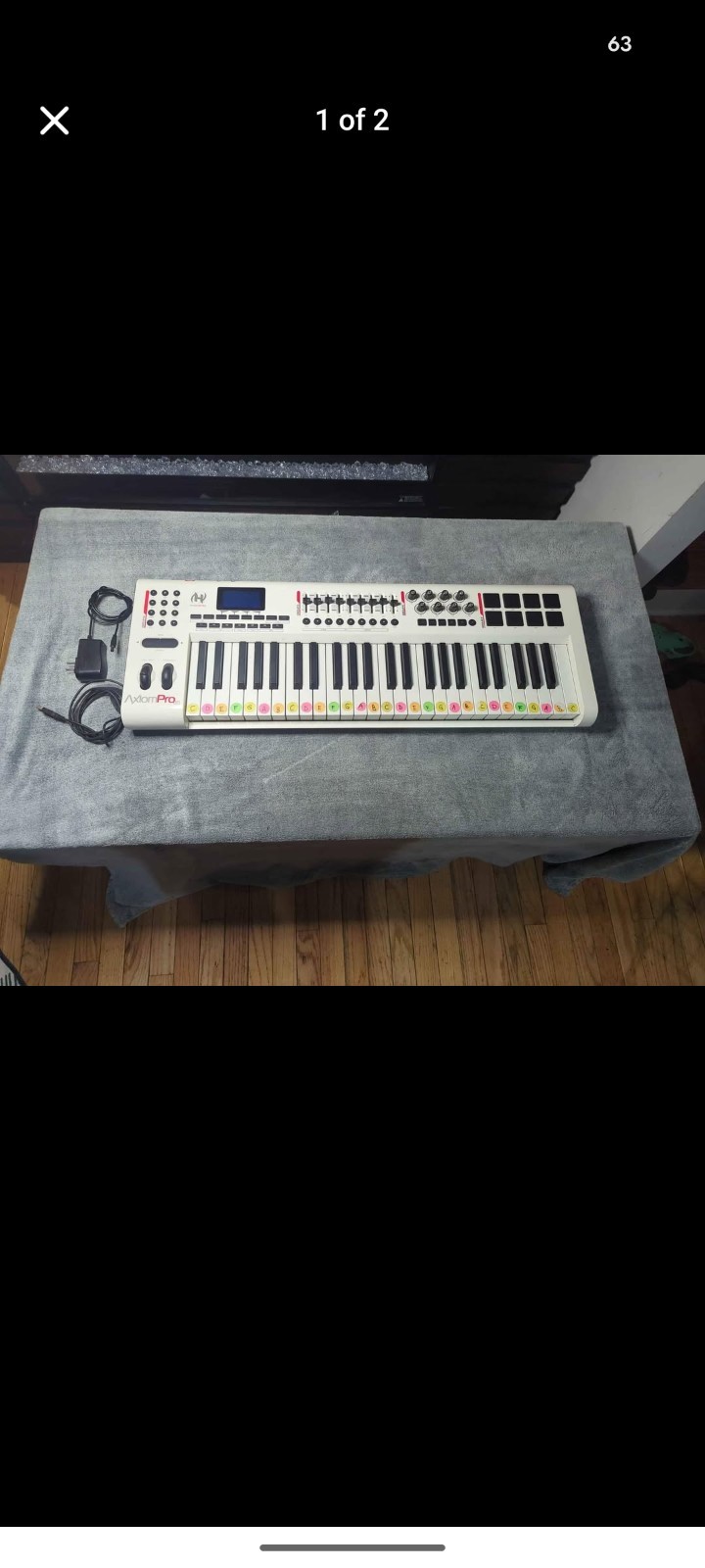 M-Audio Axiom Pro 49 MIDI Keyboard Controller, Pad Triggers, 49 Keys, with Stand