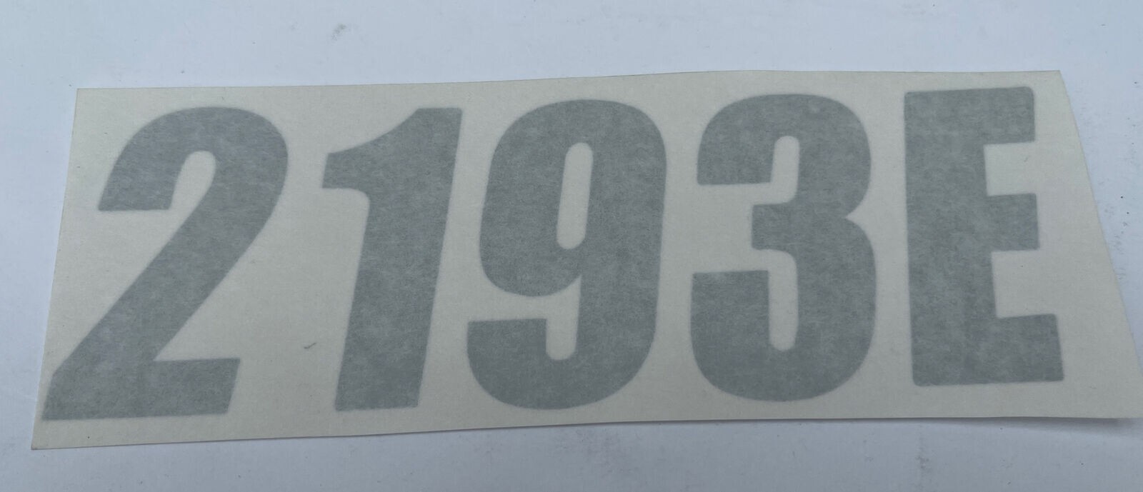Nissan 2193E Front bumper reproduction decal rectangular, silver text