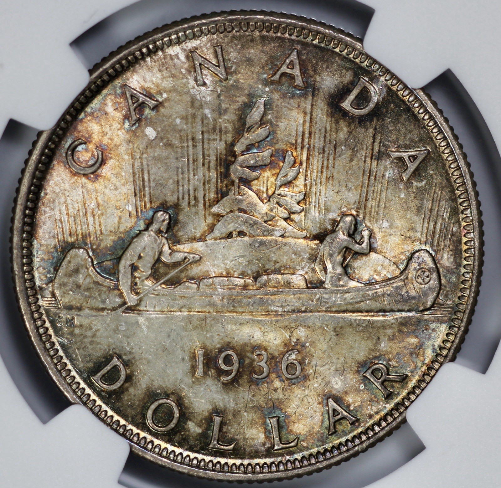 1936 Canada $1 Silver Dollar NGC MS 64 Amber Toning