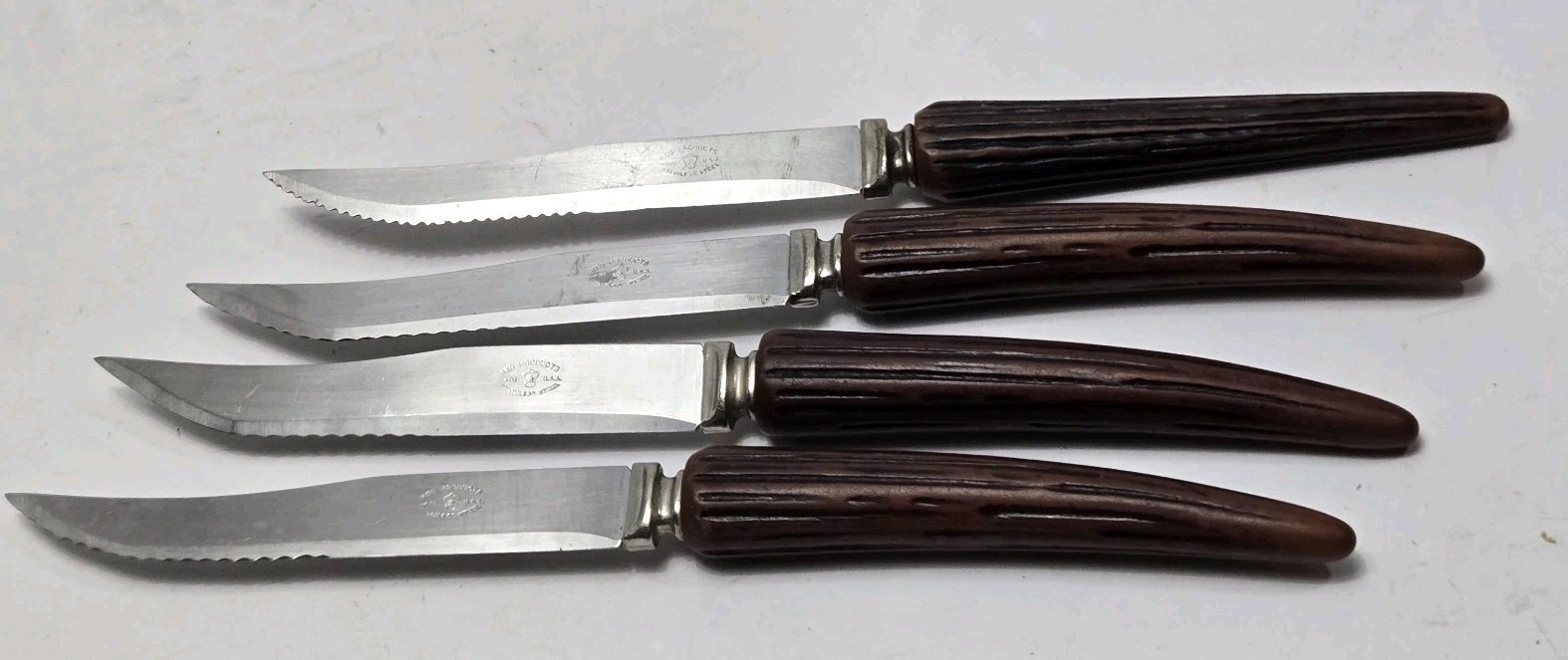 Vintage Steak Knives Red Products USA Lot of 4 Faux Bone Antler Handles
