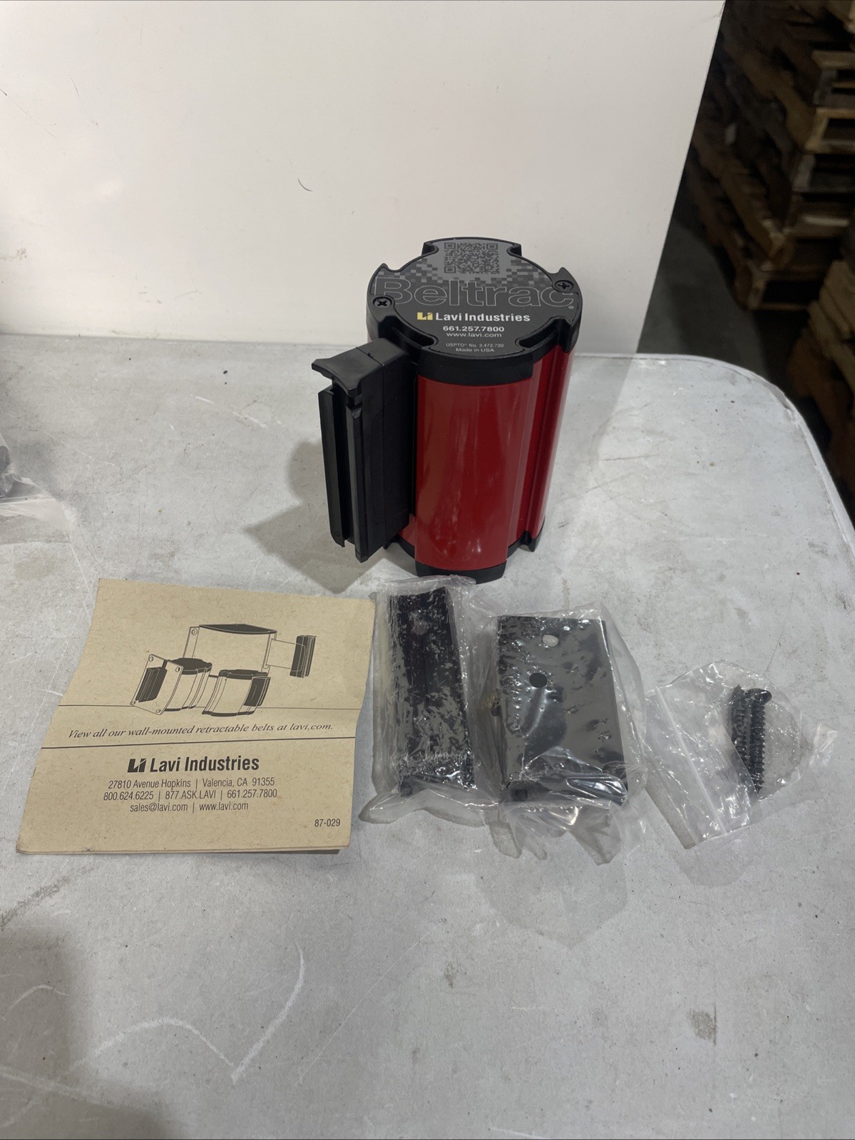 lavi industries 7-13 ft retractable belt wall mount danger live track