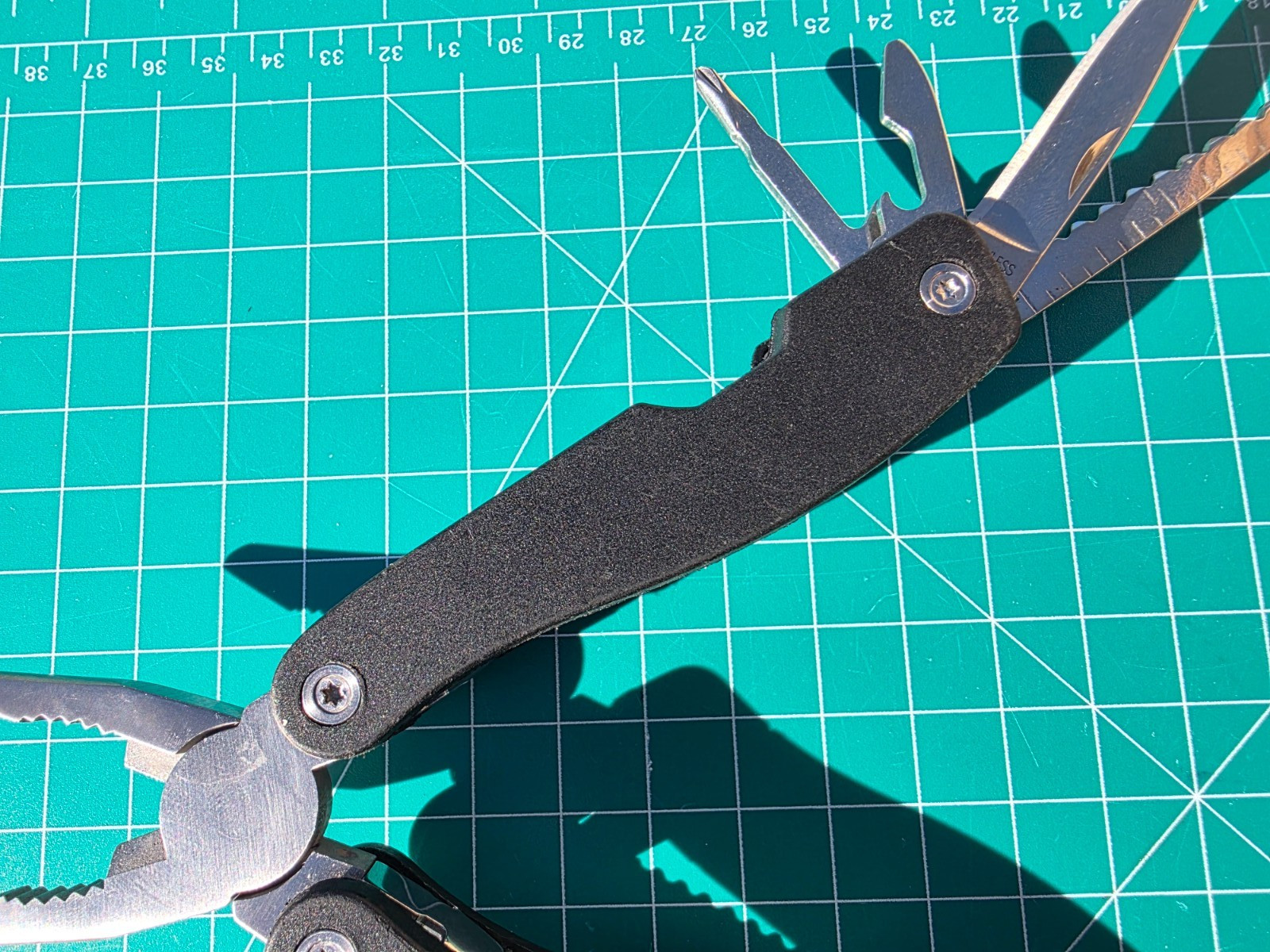 SmartGear Multi-Tool Black Stainless Steel LED Working Flashlight USB-C