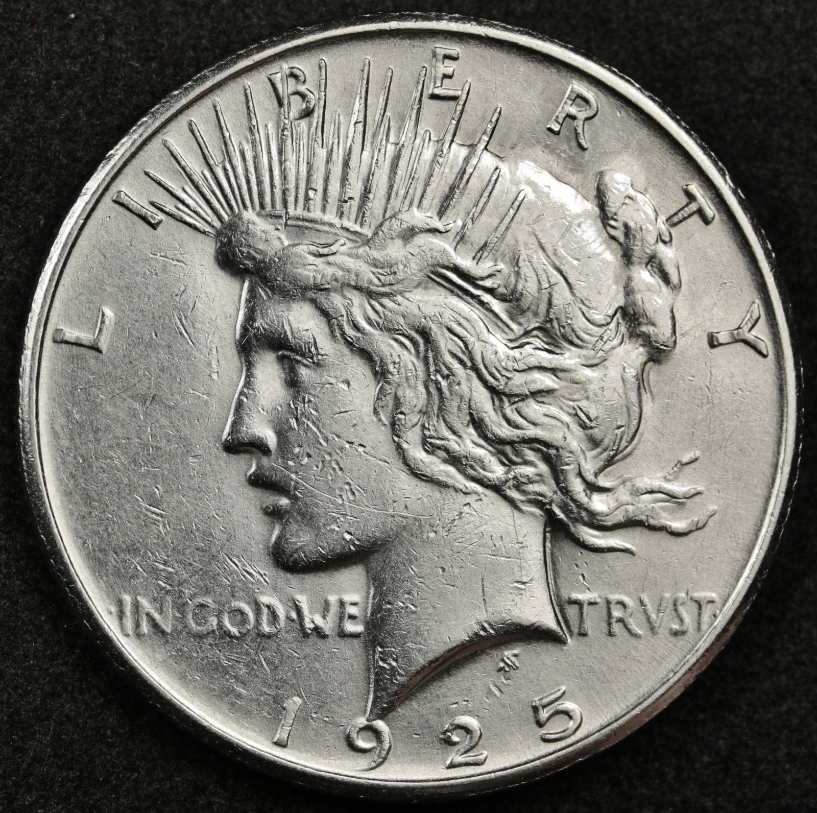 1925-s Peace Silver Dollar.  Nice Strike.  A.U.  Inventory H.  123435