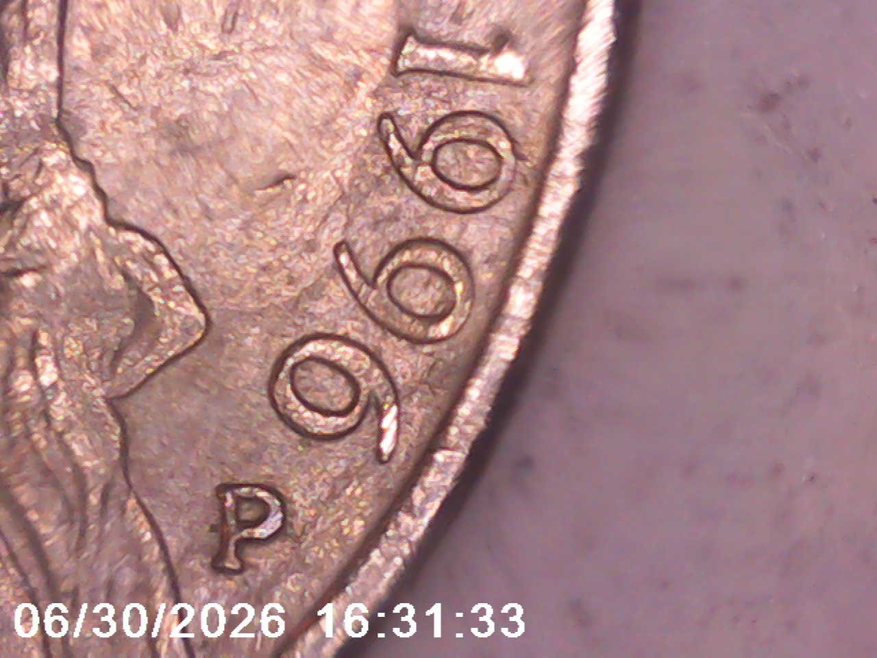 1996-P Jefferson Nickel Strike Through On the Reverse