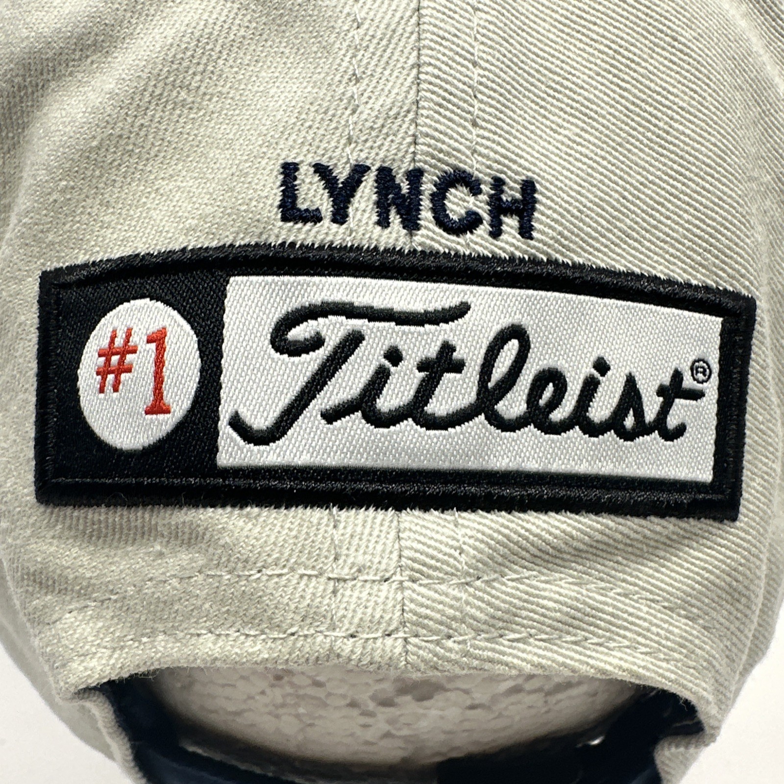 Titleist Golf Strap Back Hat Beige Cap Embroidered #1 Lynch Adjustable