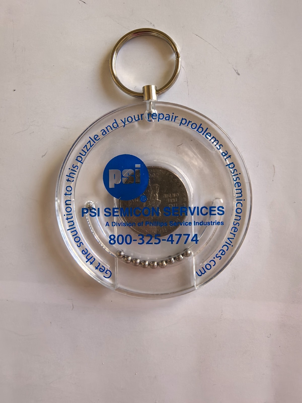 "Coin Escape Puzzle" keychain