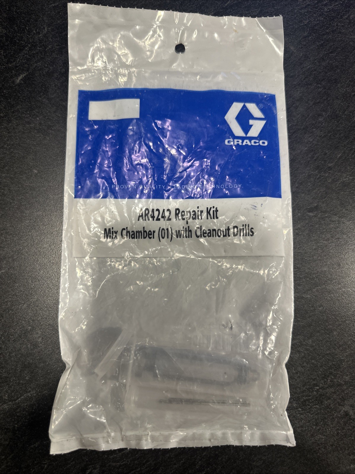 Graco 4242 Mixing Chamber With Clean Out Bits