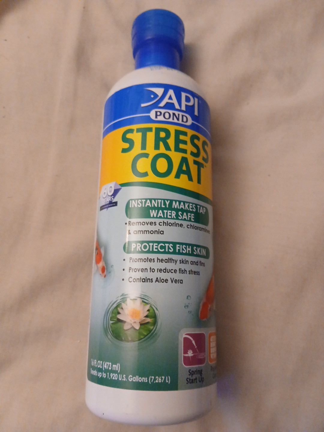 API POND STRESS COAT Pond Water Conditioner 16-Ounce Makes Tap Water Safe bottle