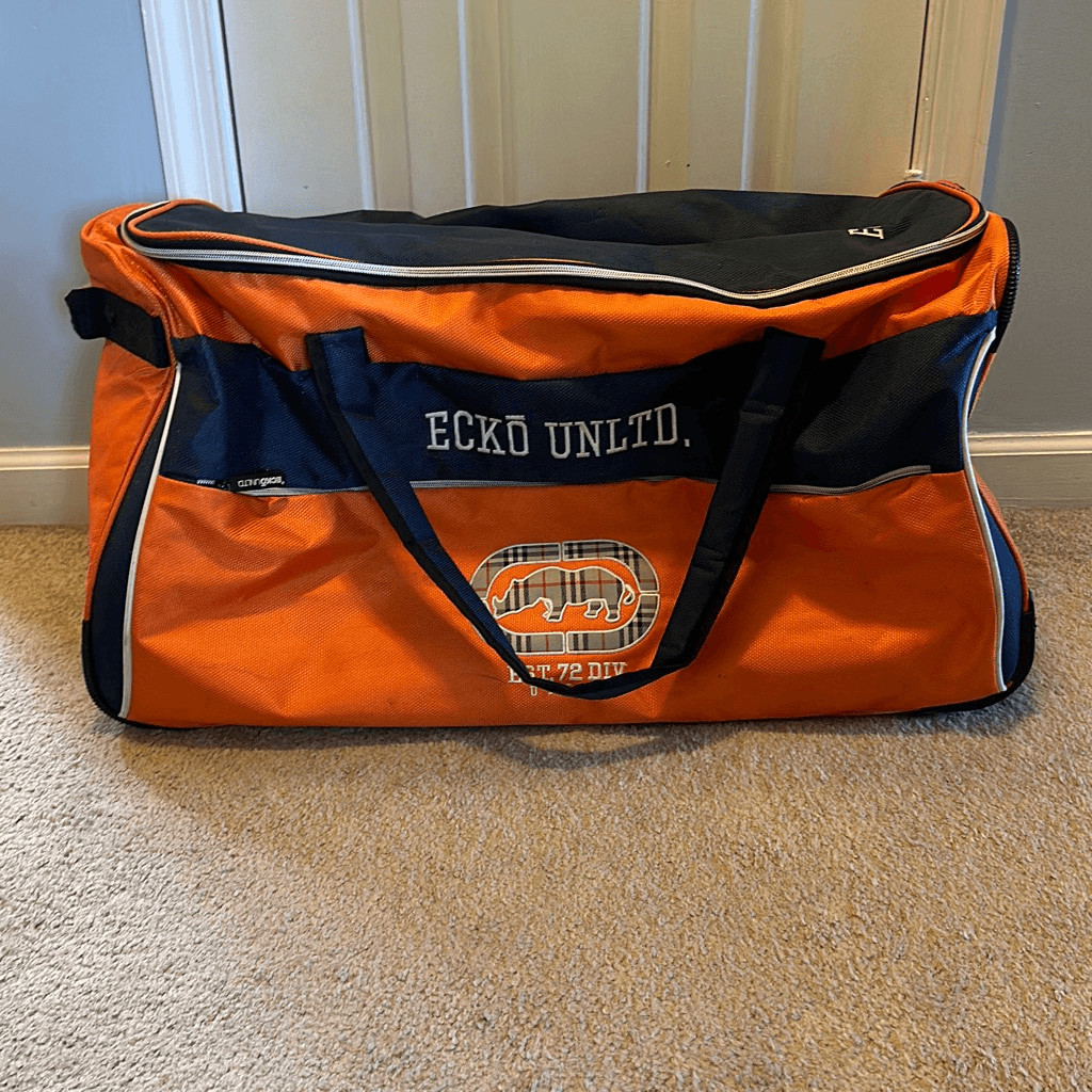 Ecko Unltd. Ecko Unlimited Orange Blue 28-inch Large Rolling Duffel Bag