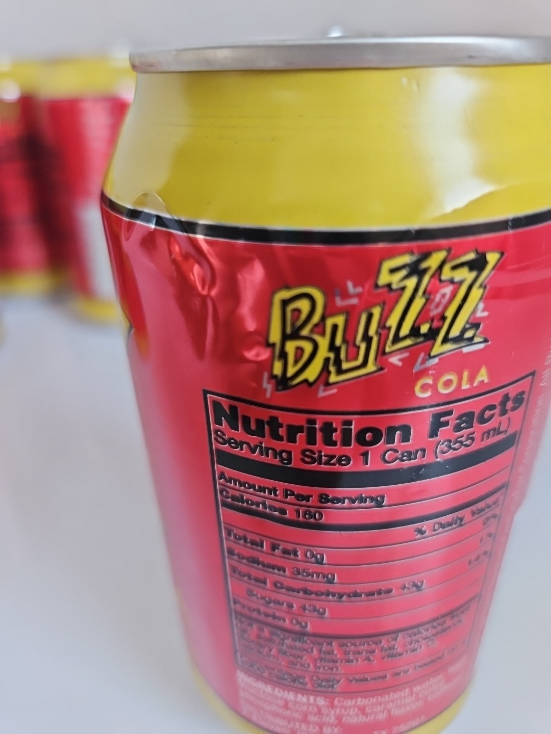 Simpsons Buzz Cola Six Empty Cans