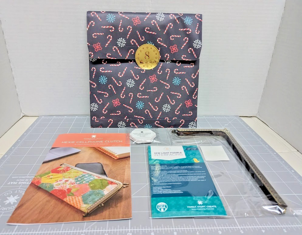 Missouri Star Quilt 2024 Jenny's Countdown Box - #8 Hexie Cellphone Clutch Kit