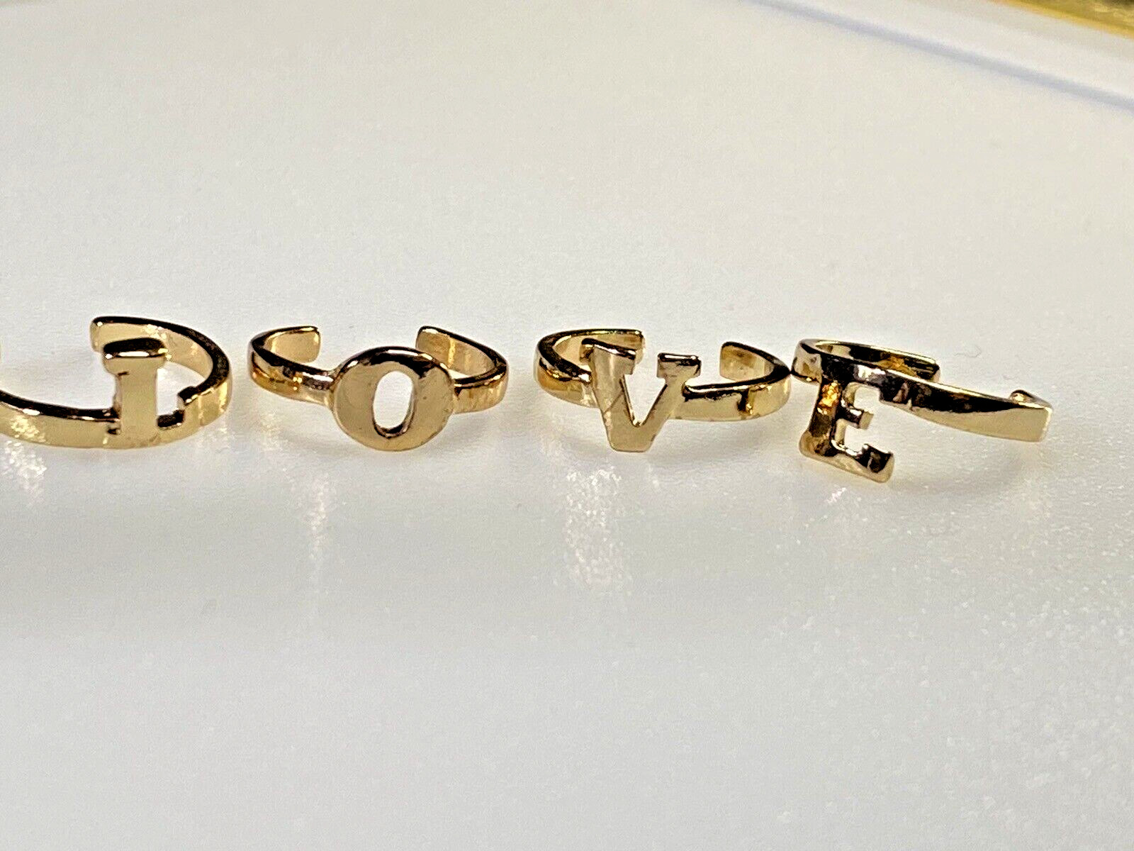 Avon Toe Rings Set Of Four Gold Metal Worn Together make Word Love