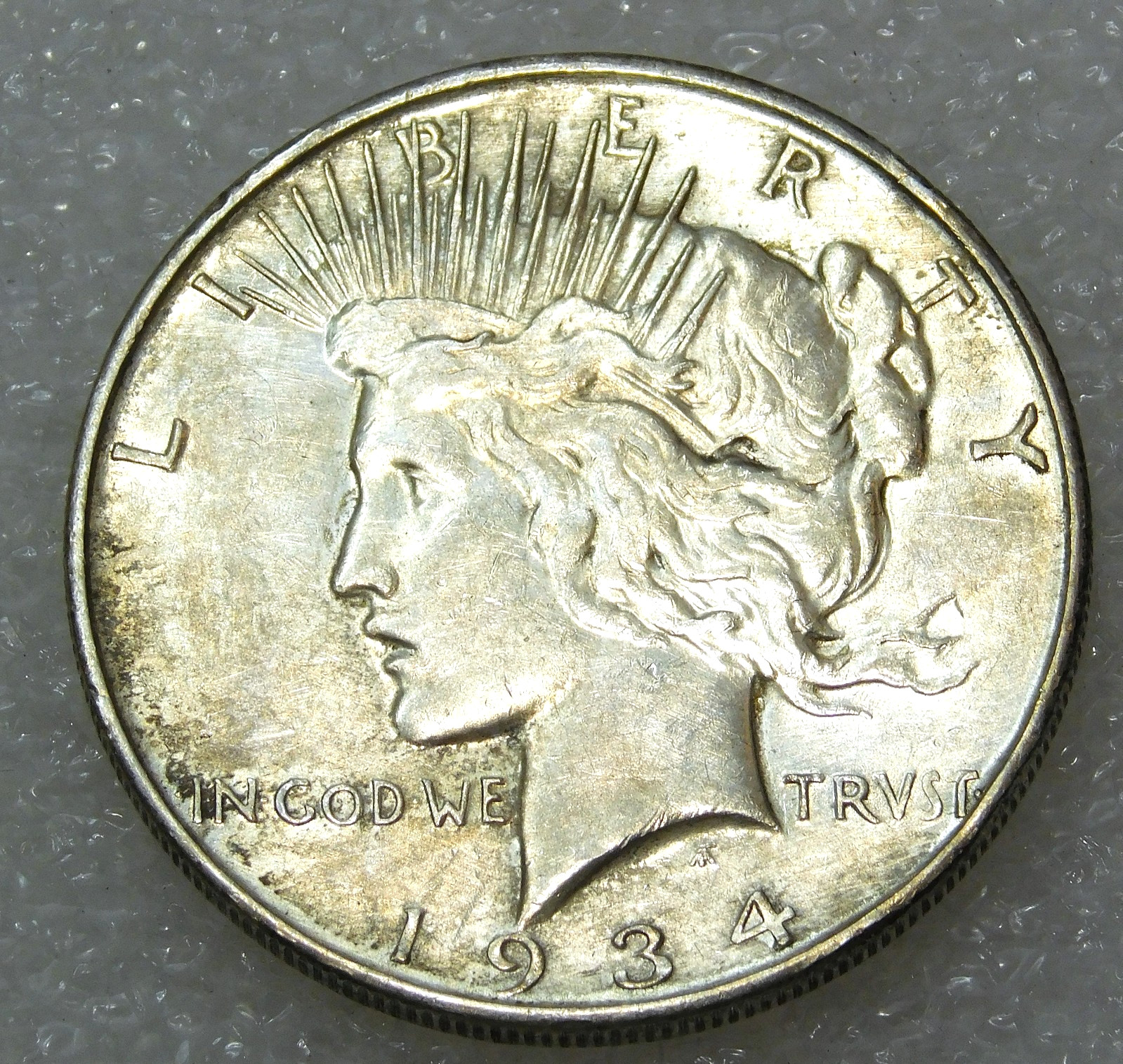 1934 D Peace Silver Dollar XF/AU Frosty luster in saflip #M391