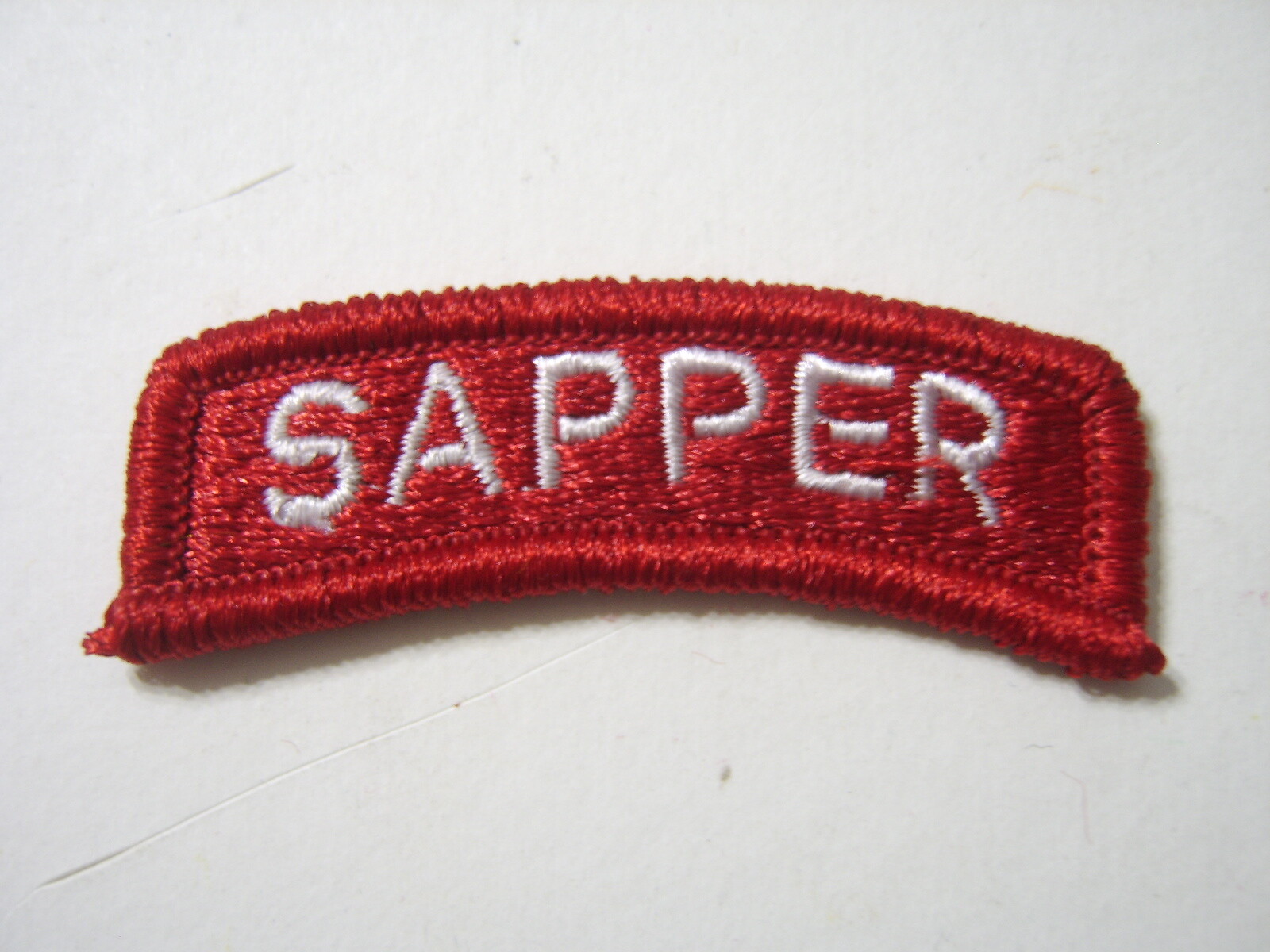 SAPPER TAB WHITE ON RED - ARMY ENGINEER TAB