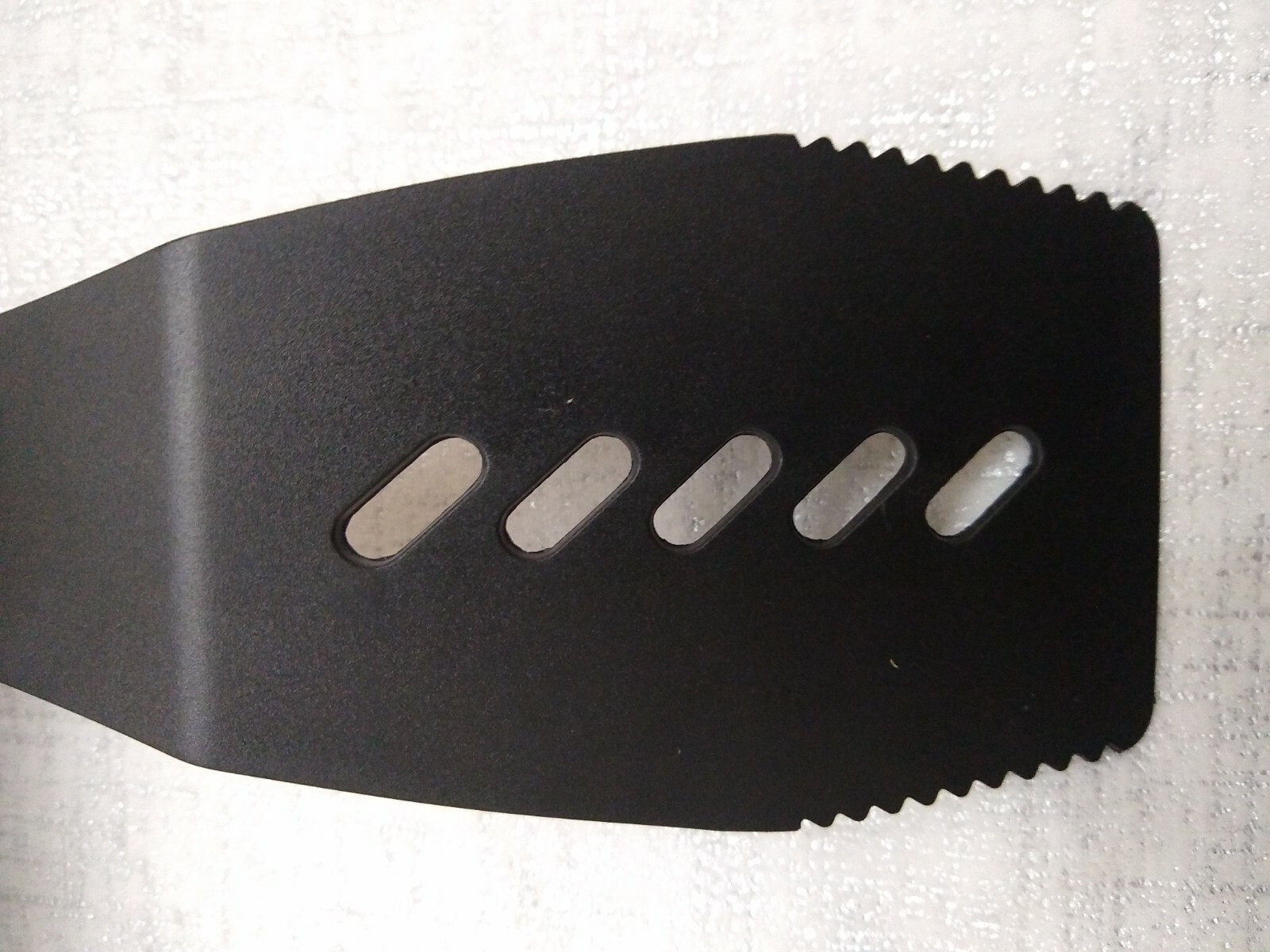 Hic serrated turner , black plastic ,pot hook