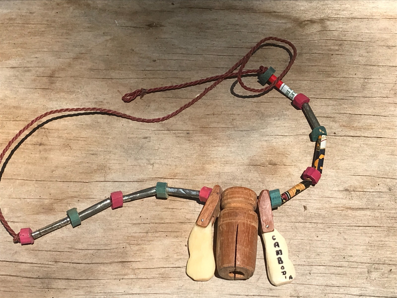 lot of 2 cambodian necklace hand carved hard wood bells