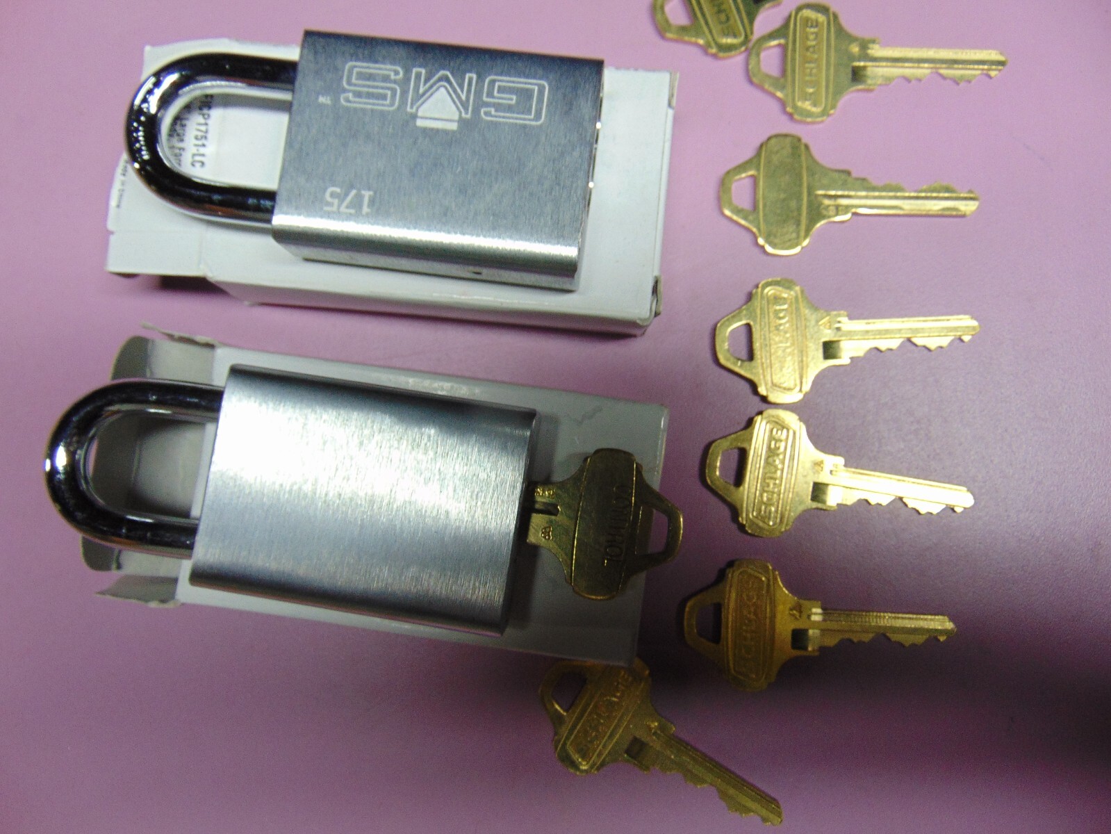 2 NEW GMS PADLOCK WITH IC SCHLAGE AND  7 C123 AND CON. KEYED THE       LOCKSMITH