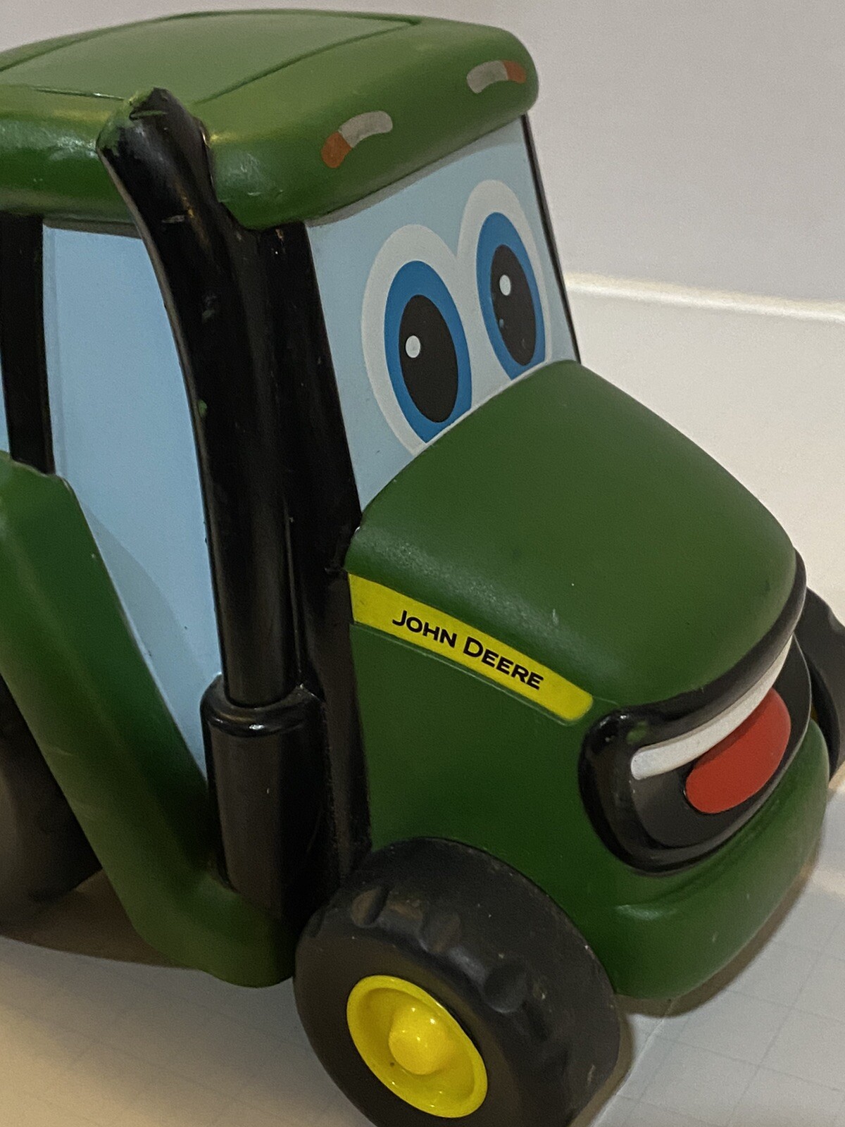 John Deere Rubber & Plastic Three Pc Tractor Set. Push Button & Music Plays